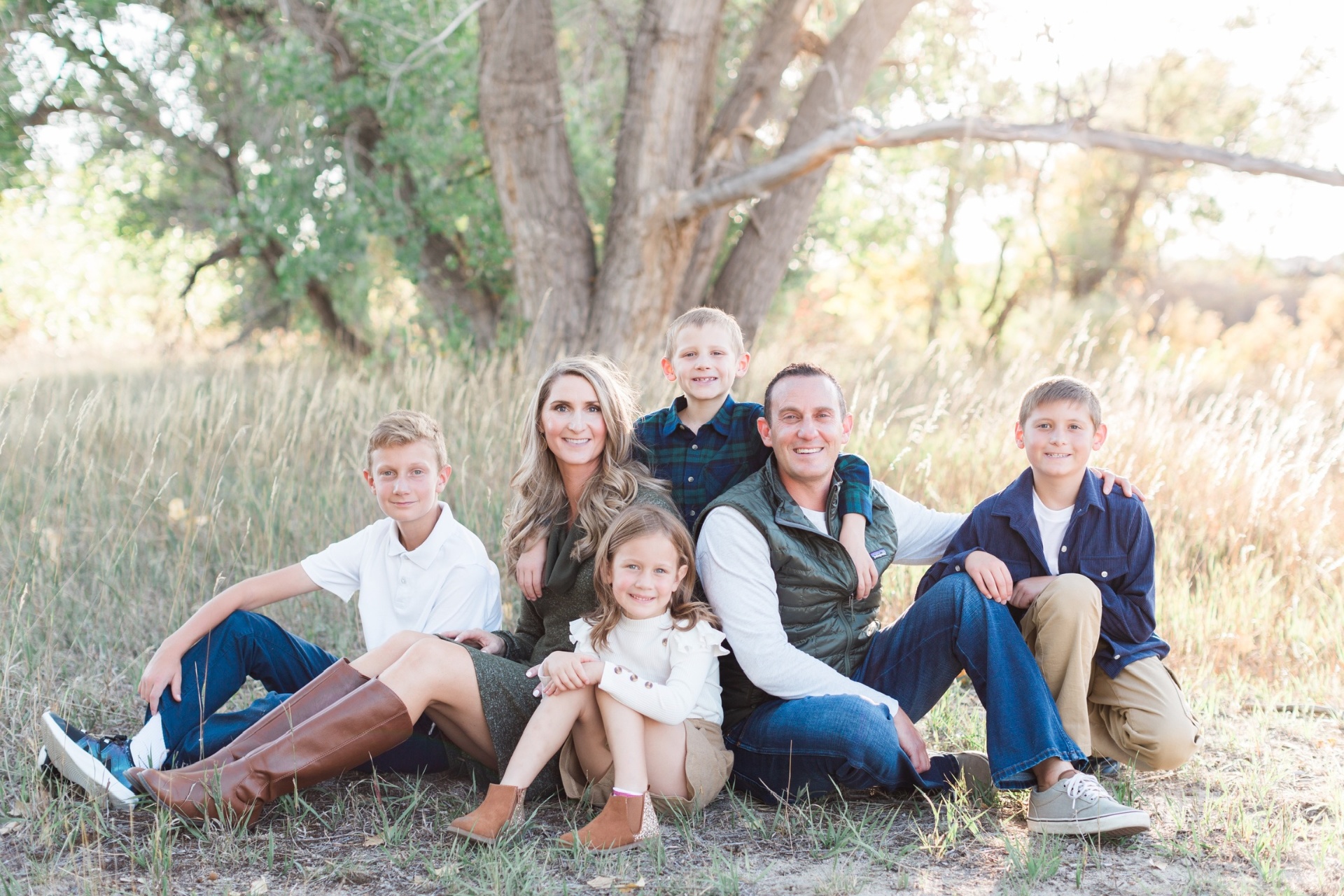 Doug Aumont and his family in a Colorado field at golden hour